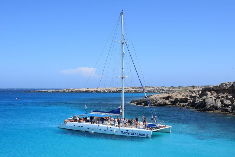 Enjoying the clear waters of Mauritius by boarding on the Catamaran cruise