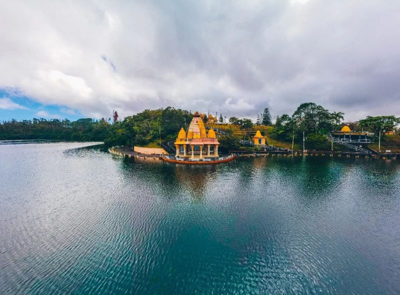 visit the sacred Hindu site in Mauritius with a calming view of the lake surrounding the temple.